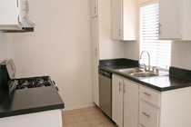 This photo is the visual representation of gourmet kitchens at Central Park East Apartments.